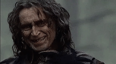 Man With Long Hair Smiling Holding Bird GIF