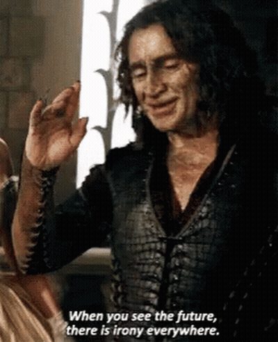Man With Long Hair Talking About Future With Irony GIF