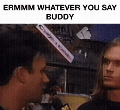 Man With Long Hair Talking Into Microphone GIF