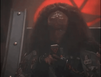 Man With Long Hair Wearing Eagle Jacket GIF