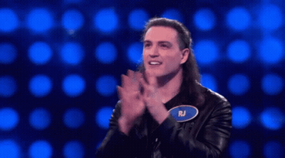 Man With Long Hair Wearing RJ Name Tag GIF