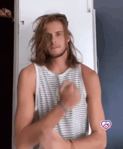 Man With Long Hair Wearing Striped Tank Top GIF