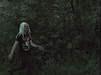 Man With Long White Hair And Mustache Wearing Sunglasses And -0 ! 3 Shirt GIF