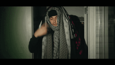 Man With Louis Vuitton Scarf Around Head GIF