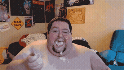 Man With Man Cave Sign GIF