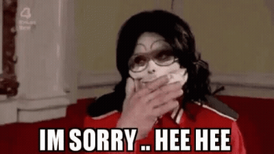 Man With Mask Covering Mouth Saying I'm Sorry Hee Hee GIF
