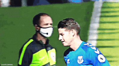 Man With Mask Talking Soccer Player Blue #9 GIF