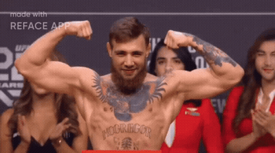 Man With McGregor Tattoo Flexing GIF
