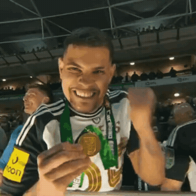 Man With Medal And Moon Shirt GIF