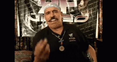 Man With Medal At WWF Sign GIF