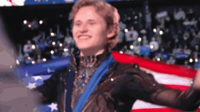 Man With Medal In Front Of American Flag GIF