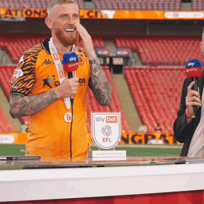 Man With Medal In Front Of Sky Sports Microphone GIF