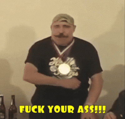 Man With Medal Says Fuck Your Ass GIF