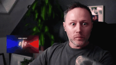 Man With Microphone And 0/2 Screen GIF