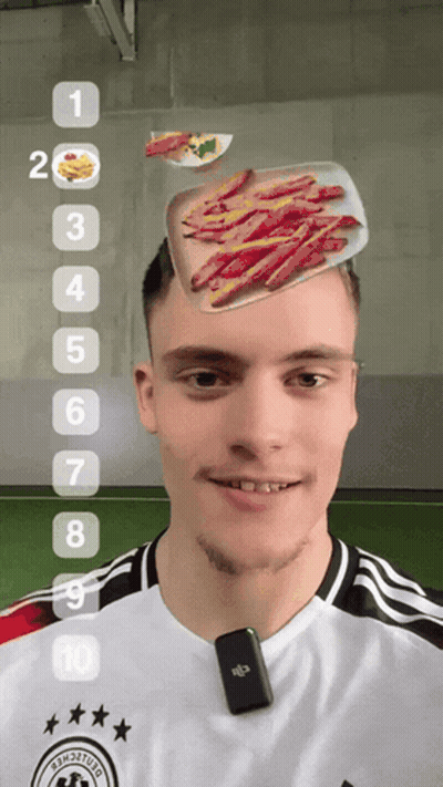 Man With Microphone Carrying Tray Of Food On Head GIF