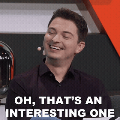 Man With Microphone In Ear Smiling Oh That's An Interesting One GIF