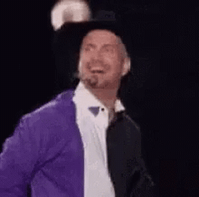 Man With Microphone In Mouth WTF Girth Brooks GIF