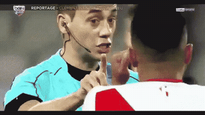 Man With Microphone On Head Talking To Man In Red And White Shirt GIF