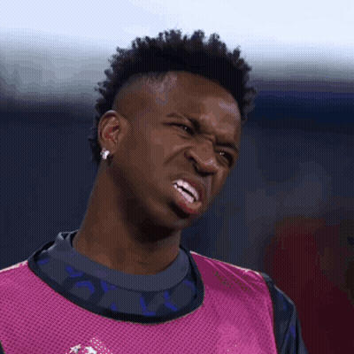 Man With Mohawk Making Funny Face In Pink Vest GIF