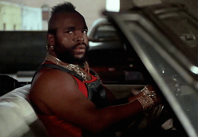 Man With Mohawk Sitting In Car Looking Out Window GIF
