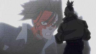 Man With Mohawk Stands In Front Of Cartoon Character GIF