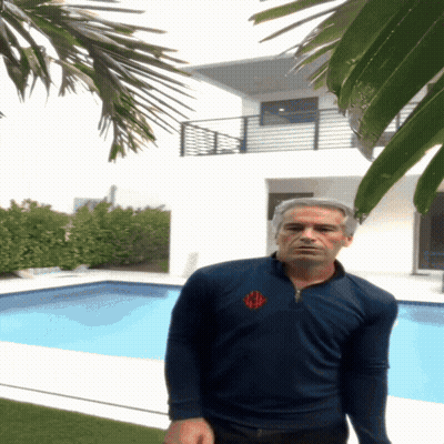 Man With Monogram Shirt At House GIF