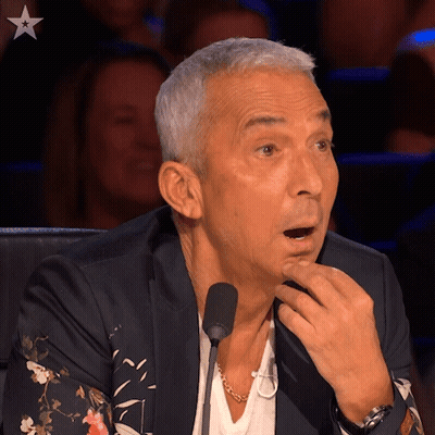 Man With Mouth Open At Microphone GIF