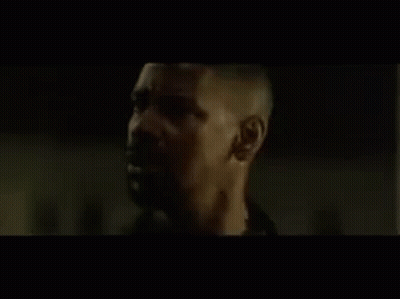 Man With Mouth Open In Dark Room GIF