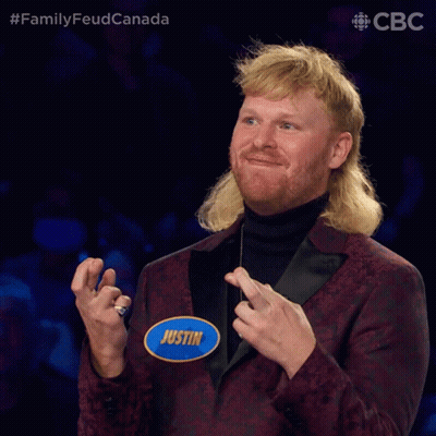 Man With Mullet And Justin Name Tag GIF