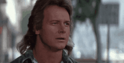 Man With Mullet Crying Tear Running Down Cheek GIF