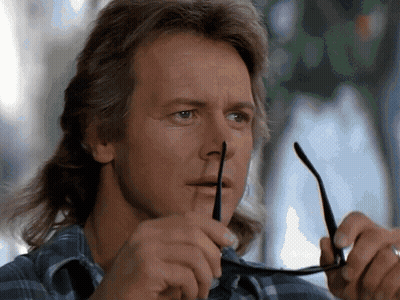 Man With Mullet Holding Glasses GIF