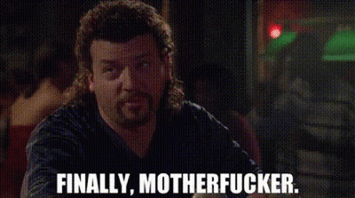 Man With Mullet Sitting At Table Saying Finally Motherfucker GIF