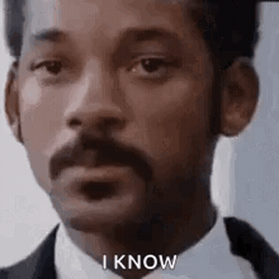 Man With Mustache And Beard In Suit And Tie GIF