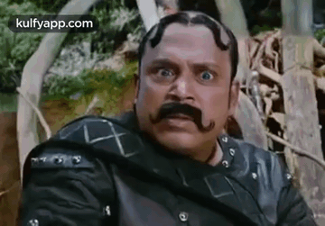 Man With Mustache And Beard Making Funny Face GIF