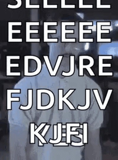Man With Mustache And Ear Buds Says Useless GIF