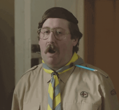 Man With Mustache And Glasses In Boy Scout Uniform GIF