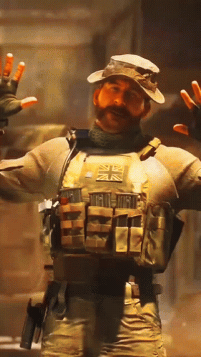 Man With Mustache And Hat In Dark Room GIF