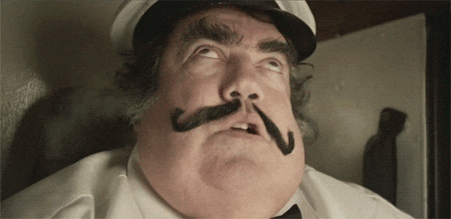 Man With Mustache And Hat Looking Up GIF