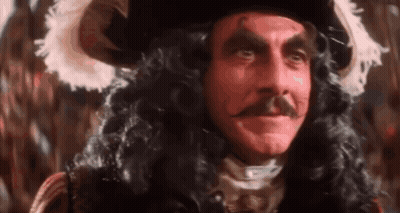 Man With Mustache and Pirate Hat and Wig