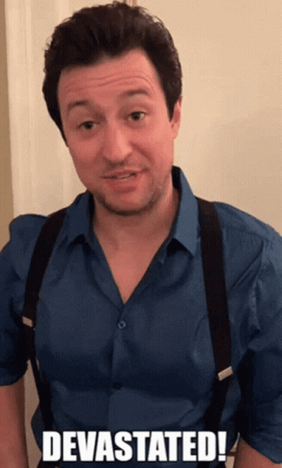 Man With Mustache And Suit Looking Down Eyes Closed GIF
