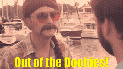 Man With Mustache And Sunglasses Says Out Of The Boobies GIF