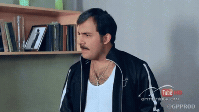 Man With Mustache And Tube Pro Sign GIF