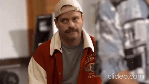 Man With Mustache, Baseball Cap, And Red Jacket GIF
