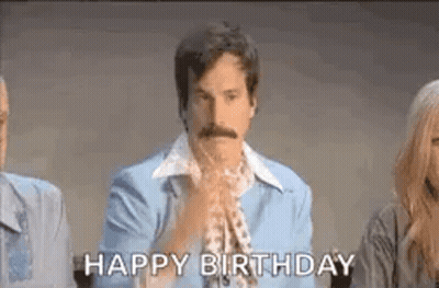 Man With Mustache Clapping In Front Of Group GIF