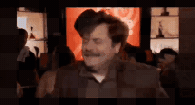 Man With Mustache Dancing In Dark Room GIF
