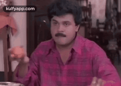 Man With Mustache Eating Apple GIF