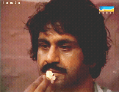 Man With Mustache Eating Popcorn Lamia Dubai GIF