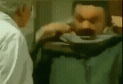 Man With Mustache Examined By Doctor GIF