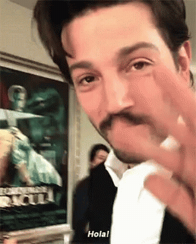 Man With Mustache Giving Middle Finger Says Hola GIF