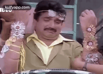 Man With Mustache Headband And Bracelets GIF
